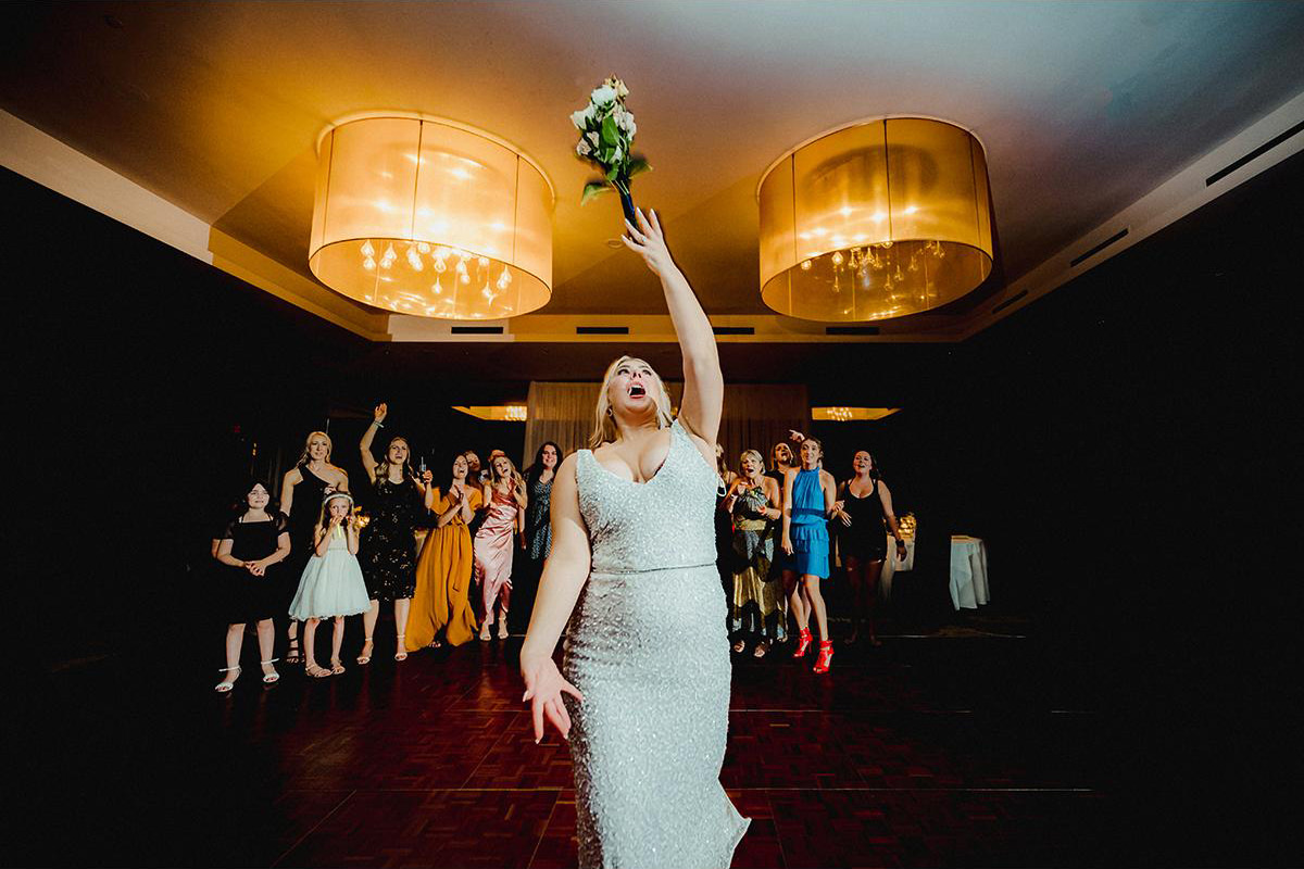 The History of the Bouquet Toss: From Flower Theft to Feminist Rebellion