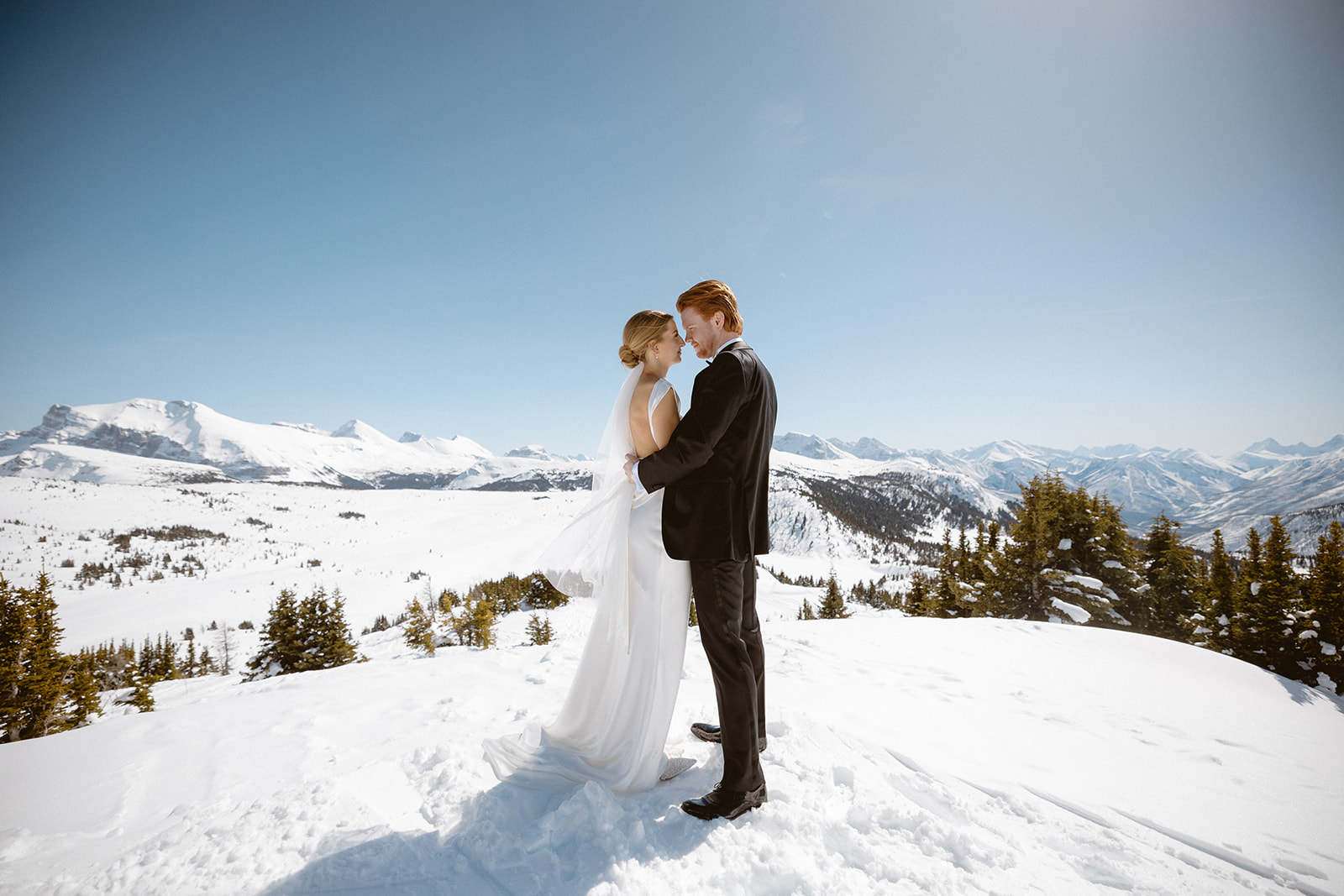 Featured Wedding: Heather & Sean's Ski Elopement at Banff Sunshine Village by Film and Forest