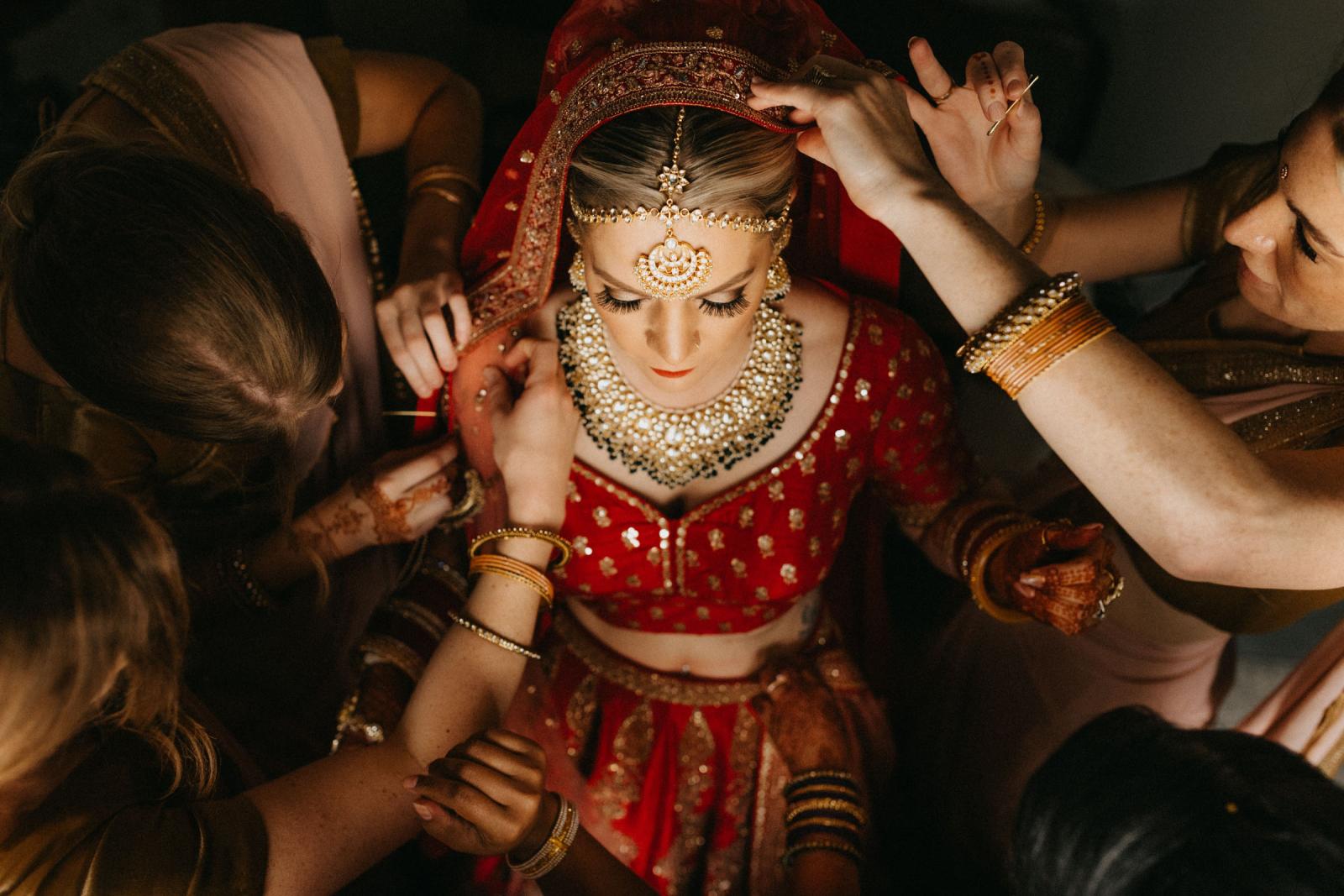 Bride Getting Ready in Traditional Indian Wedding Attire