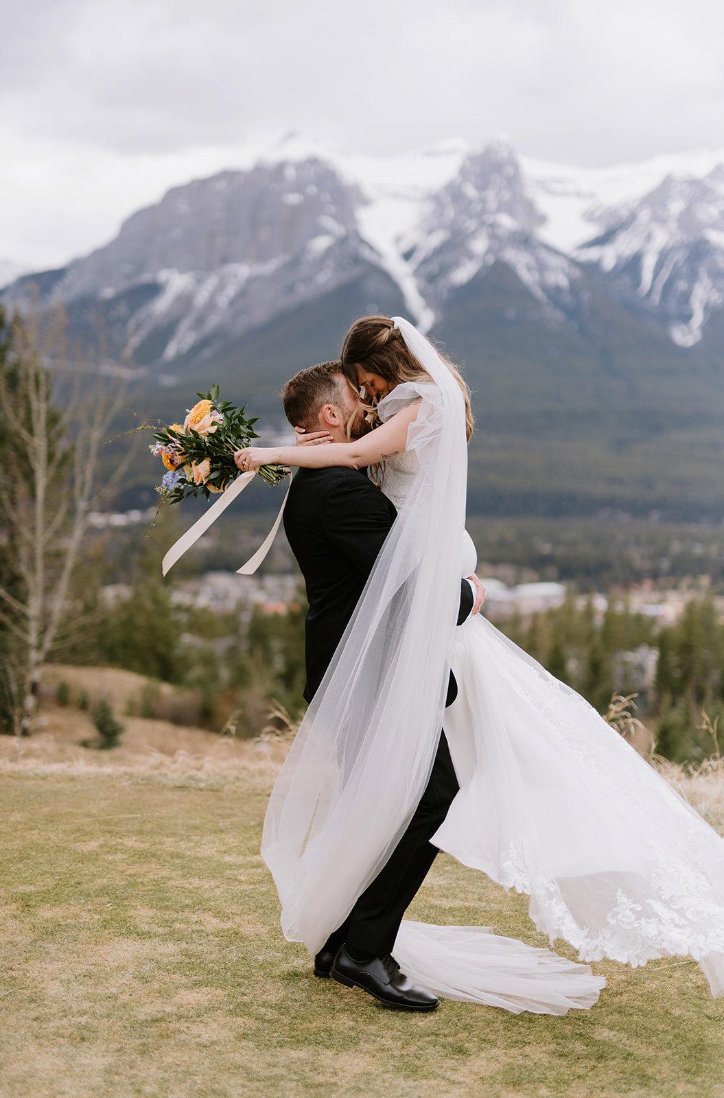 Newlywed Couple Portrait in the mountains at Silvertip Resort
