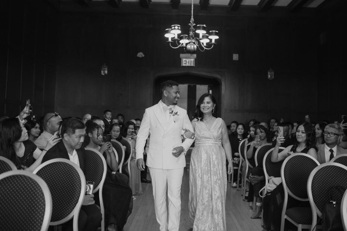Mother walking groom down the aisle at the Manitoba Club