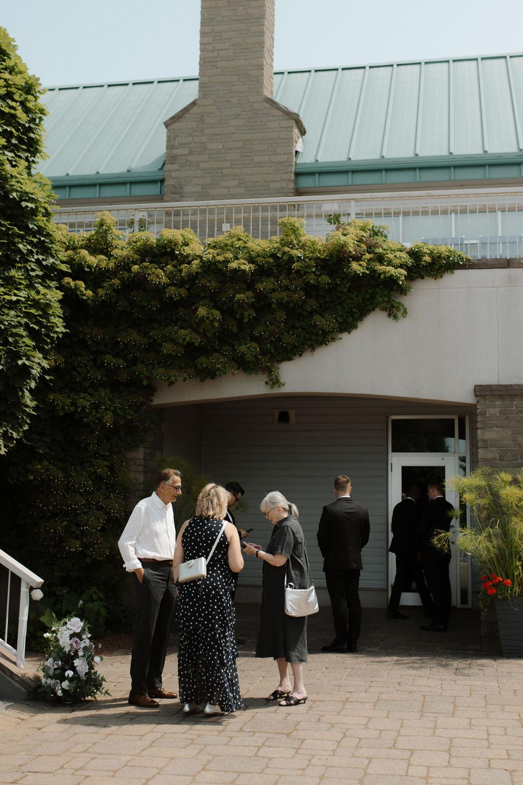 Guests gather before wedding, Fox Harb'r resort, Nova Scotia
