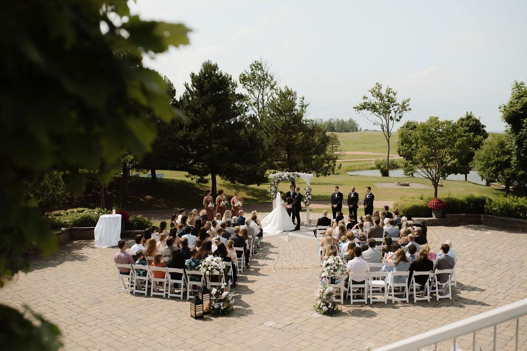 A summer wedding ceremony at Fox Harb'r resort, Nova Scotia