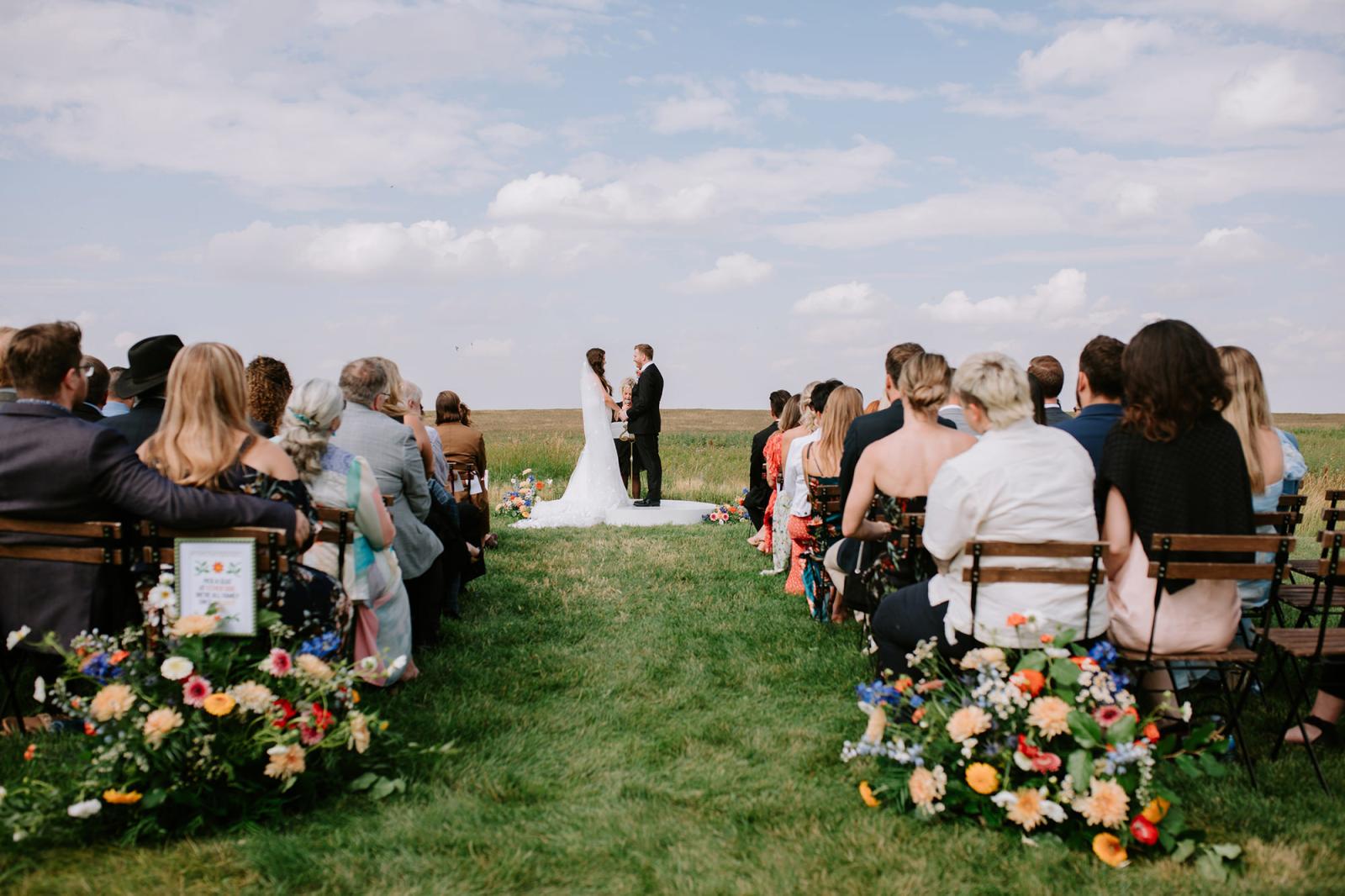 Kendra & Steven’s Colourful Summer Wedding at The Gathered in Alberta by Meaghan Baxter
