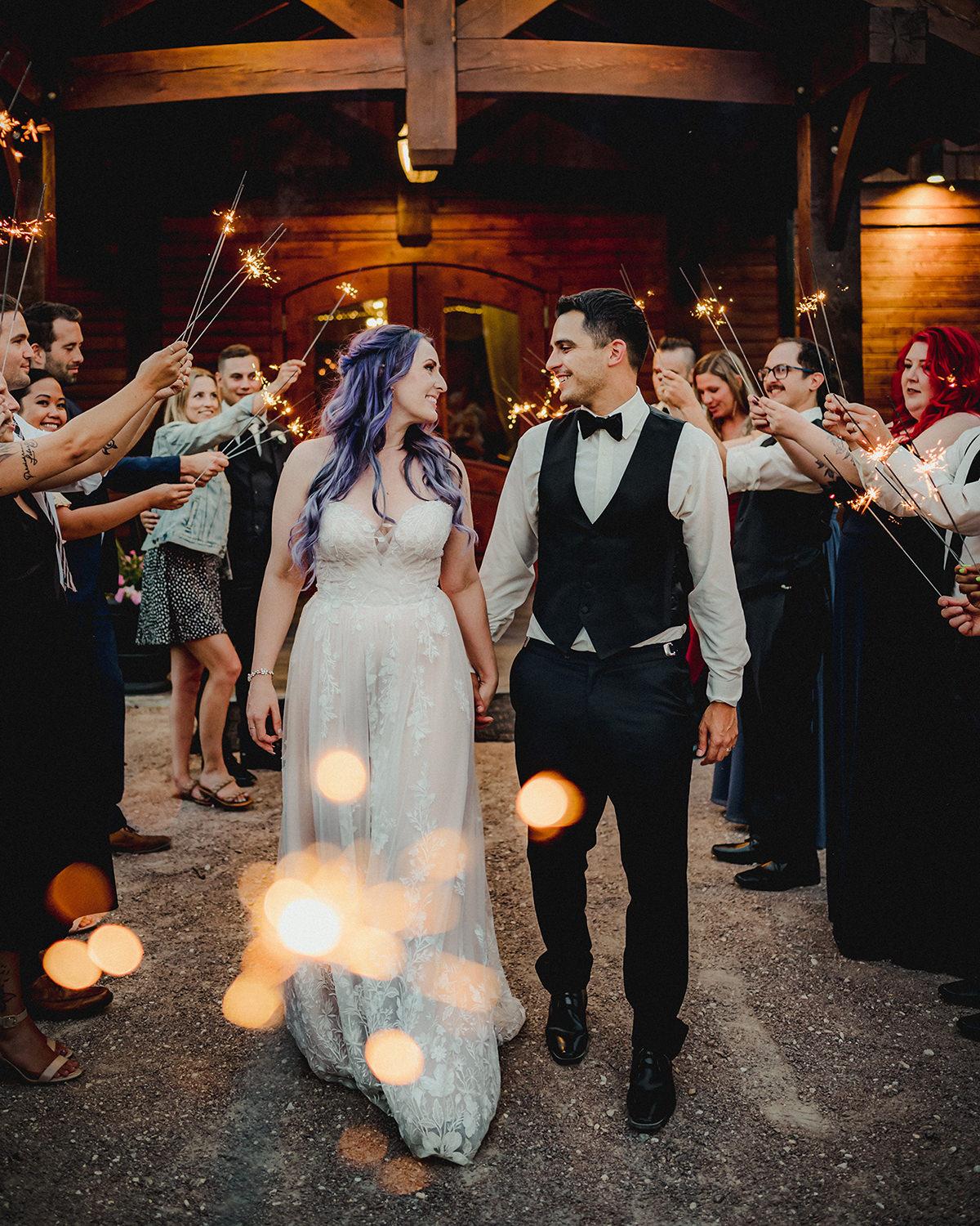 Bride and groom sparkler exit at Rivers Edge Resort in Manitoba
